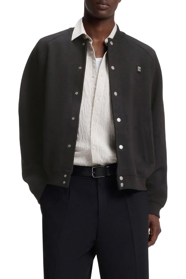 Veste aviateur noir ouvert, avec boutons-pression argent, ourlet côtelé et écusson pour homme par HUGO BOSS, vue de face