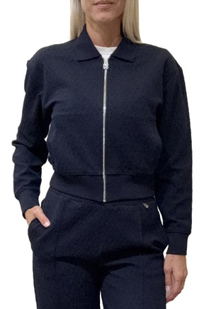 Women's navy textured zip-up knit long-sleeve knit sweater with ribbed hem and cuffs, front model view by HUGO BOSS