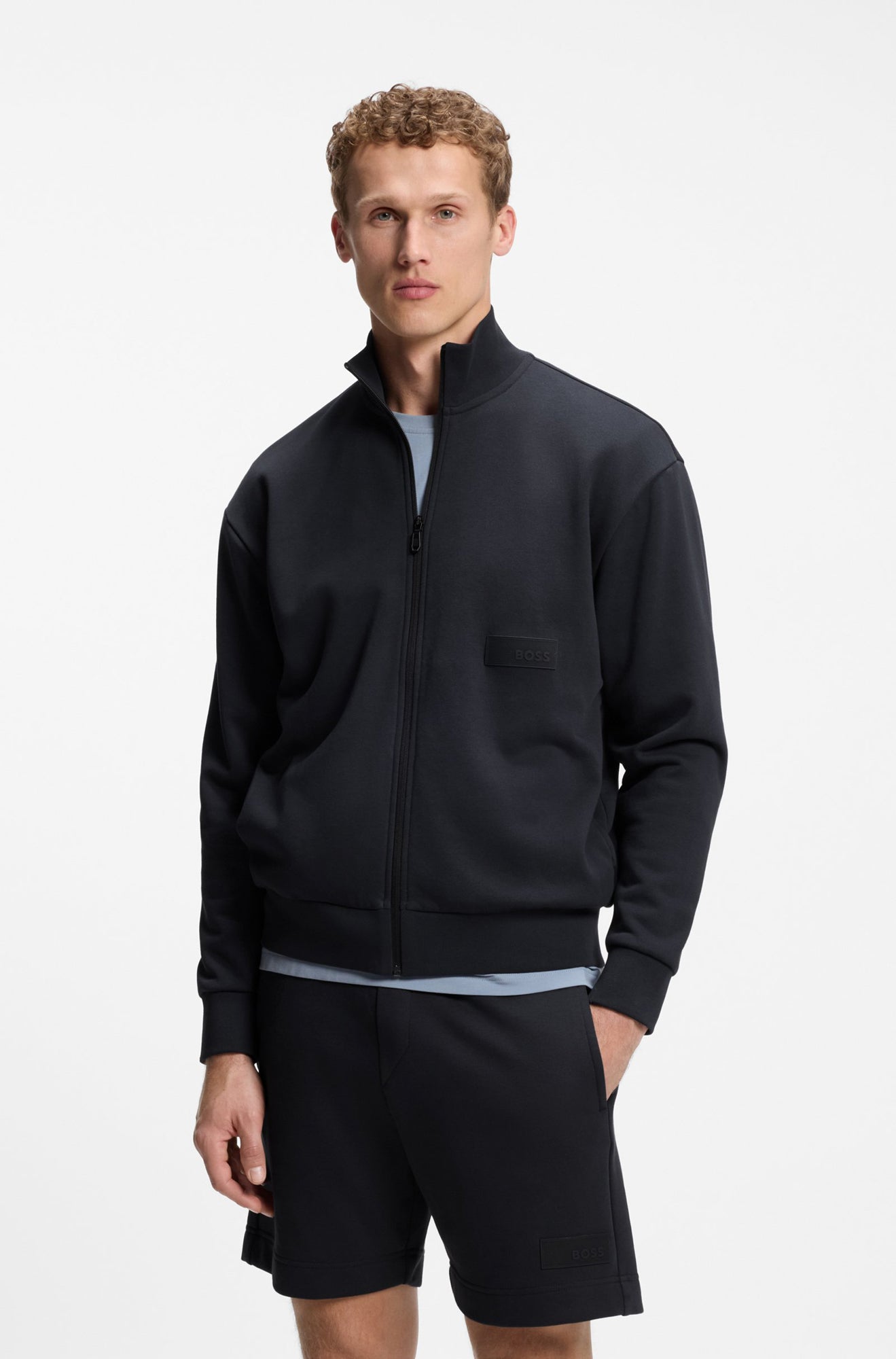 Veste à fermeture éclair pleine longueur noir, vue de face sur mannequin pour homme par HUGO BOSS