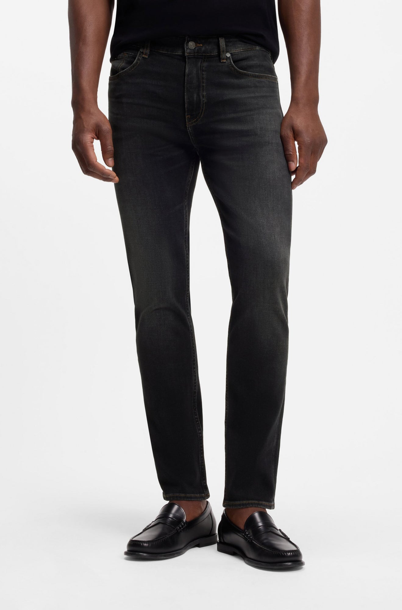 HUGO BOSS men's black washed straight-leg jeans with five-pocket styling, front model view