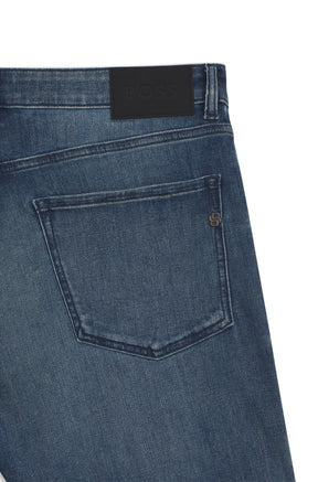 HUGO BOSS men's back pocket detail of blue washed straight-leg jeans with black BOSS waist patch and small metal B logo