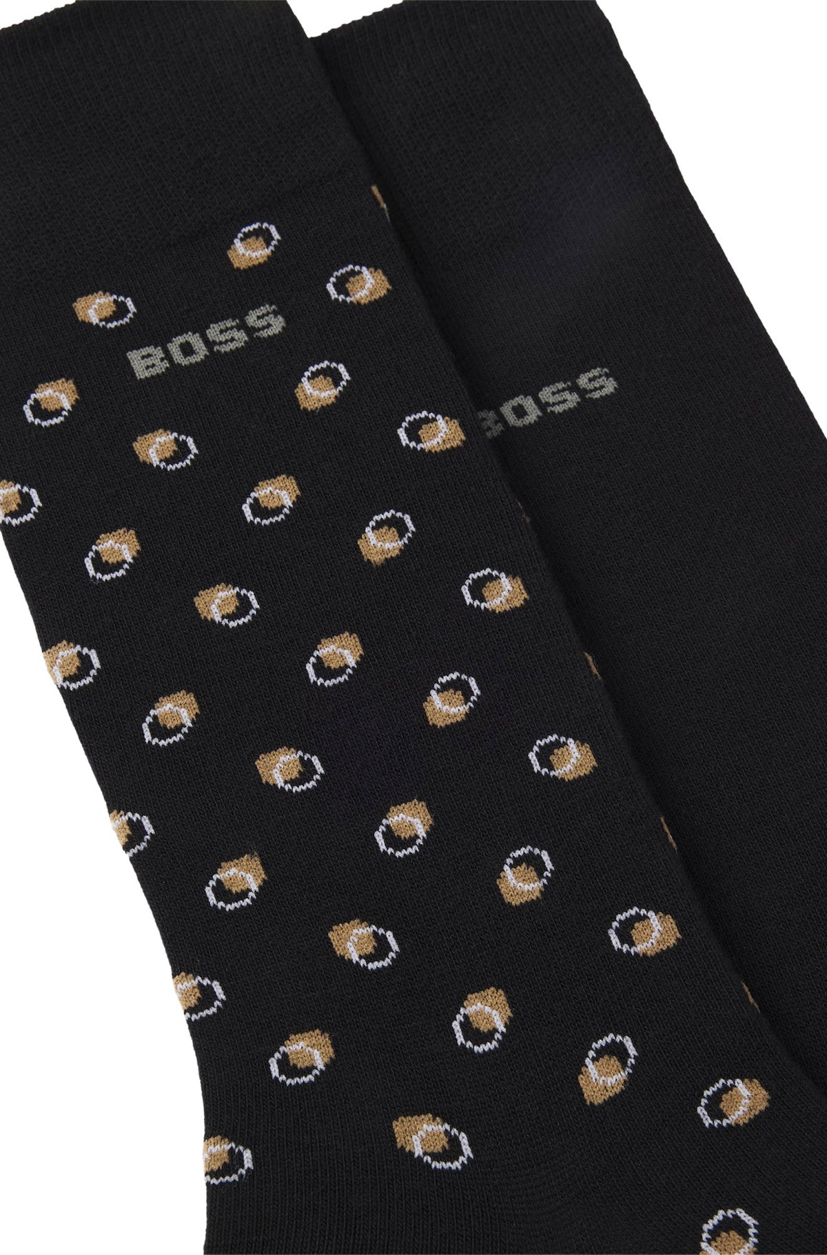 Bas noirs tricotés montrant le motif beige et blanc et les logos BOSS gris pour homme par HUGO BOSS, en gros plan