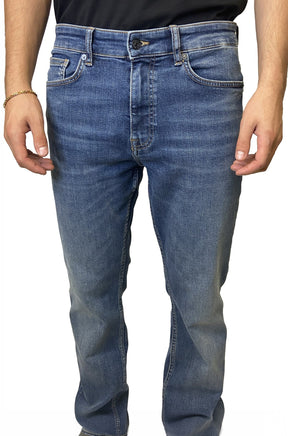 Front view of men's medium blue washed straight-leg jeans with button fly area and five-pocket styling by HUGO BOSS