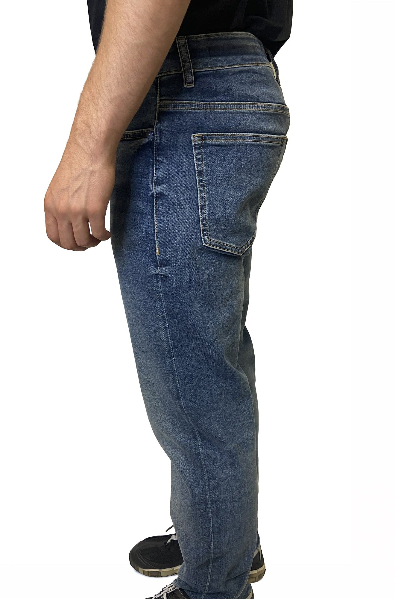 HUGO BOSS men's medium blue washed straight-leg jeans with rear patch pocket, belt loop, and faded denim texture, side view
