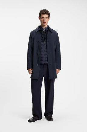 Manteau d’hiver marine avec boutons et couche intérieure matelassée zippée pour homme par HUGO BOSS, vue de face