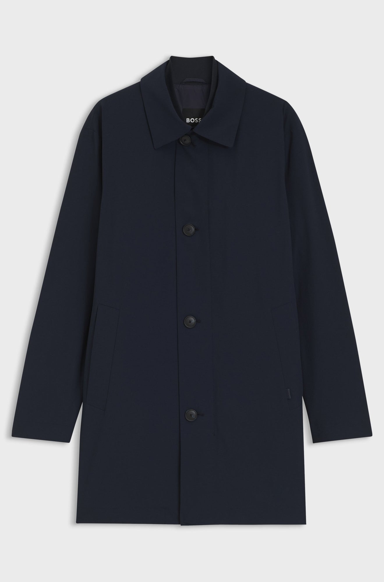 Manteau d’hiver marine avec col pointu, boutons et poches inclinées pour homme par HUGO BOSS, vue isolée de face