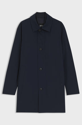 Manteau d’hiver marine avec col pointu, boutons et poches inclinées pour homme par HUGO BOSS, vue isolée de face