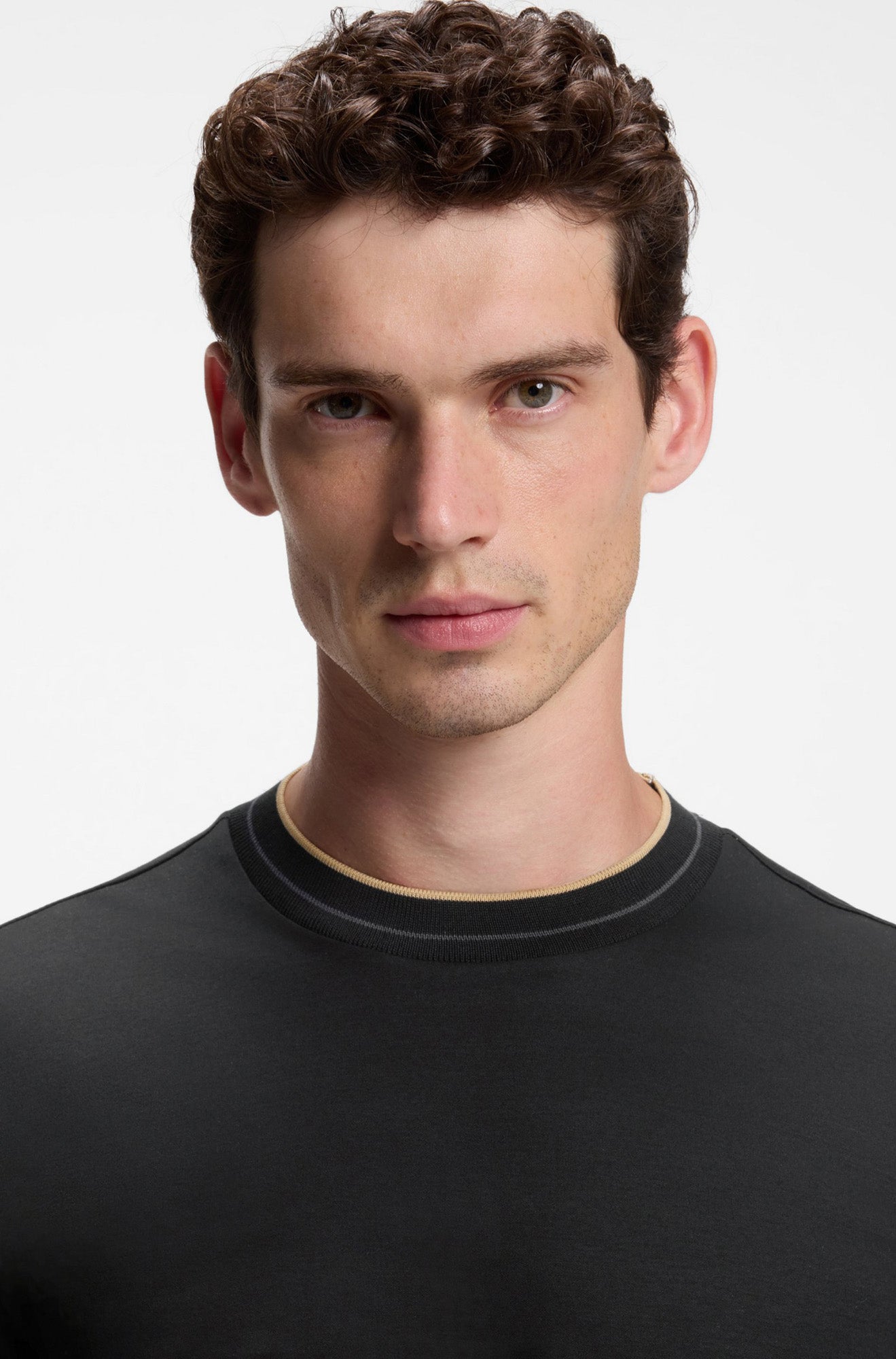 HUGO BOSS men's black ribbed long-sleeve T-Shirt with beige piping and a thin gray stripe, close-up