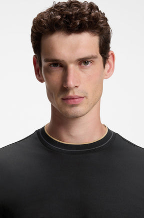 HUGO BOSS men's black ribbed long-sleeve T-Shirt with beige piping and a thin gray stripe, close-up