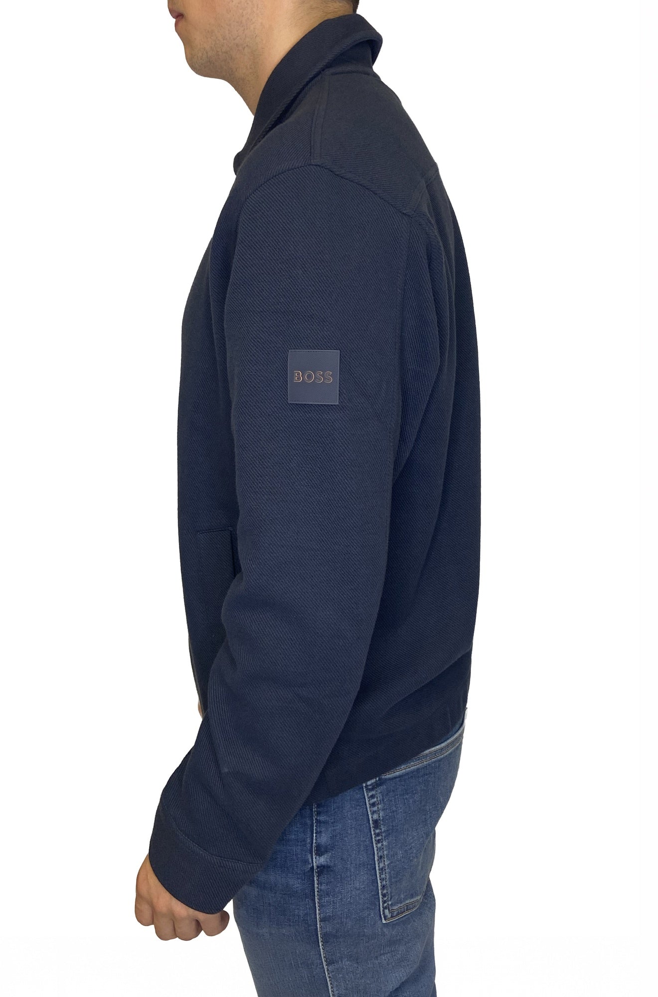 HUGO BOSS men's navy full-zip sweatshirt with fold-down collar and BOSS sleeve patch shown from the side