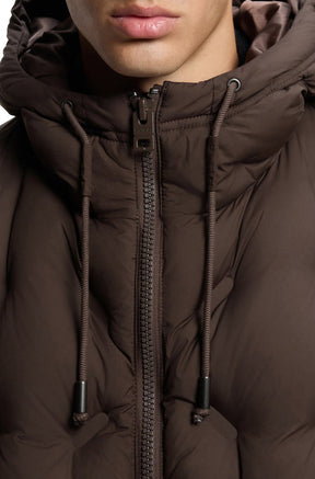 HUGO BOSS men's dark brown puffer jacket hood, drawcords, high collar, and HUGO zipper pull, close-up