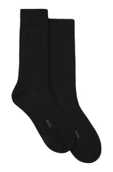 HUGO BOSS men's two black ribbed crew socks shown side by side with small BOSS logos near the toes, product view