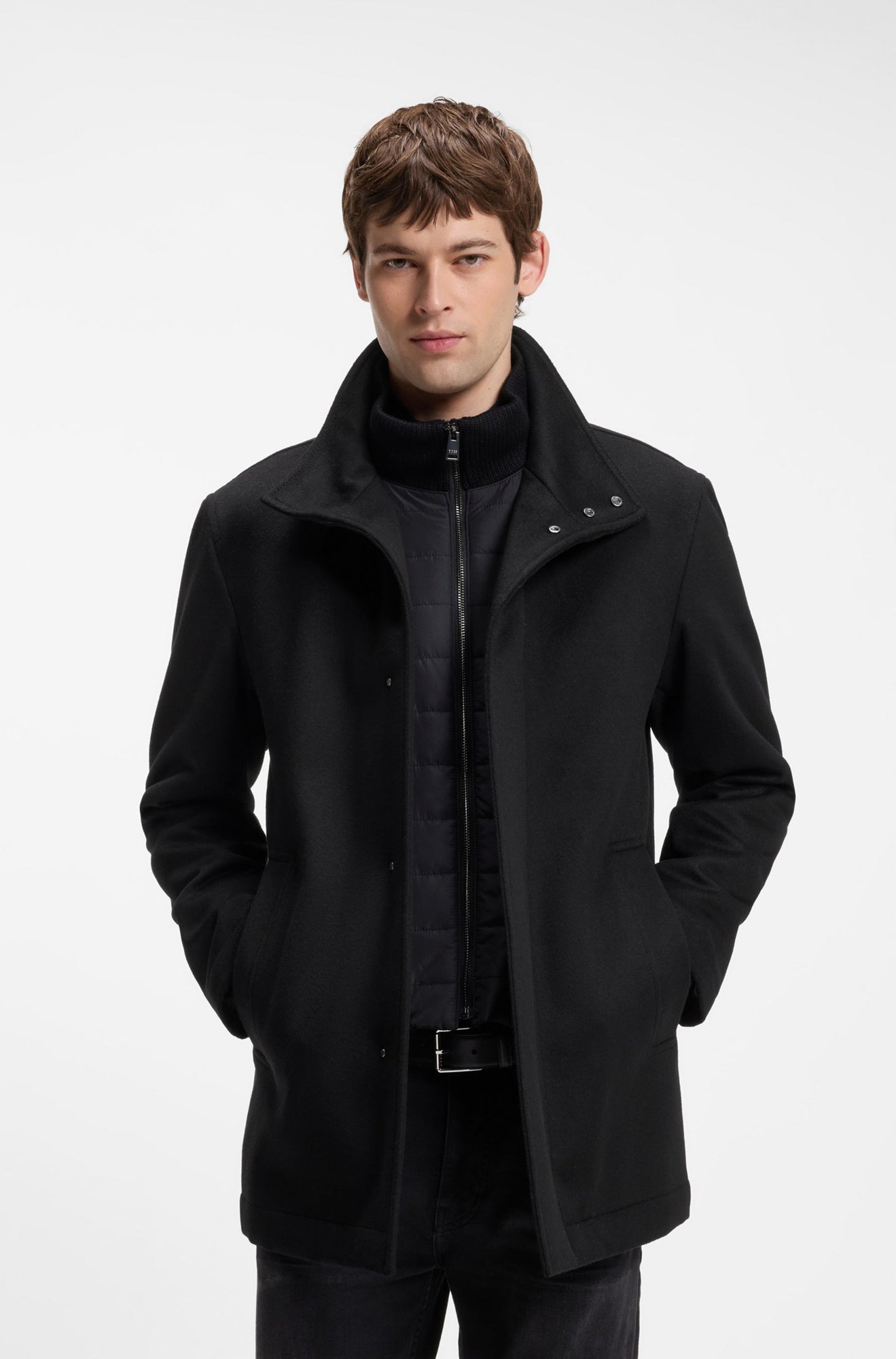 HUGO BOSS men's black winter coat with stand collar, snap placket and quilted inner panel, front view