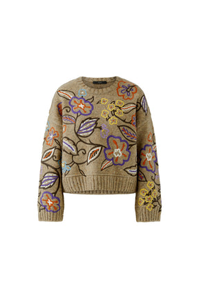Oui women's oatmeal beige knit long-sleeve knit sweater with colorful floral embroidery and ribbed hem shown from the front