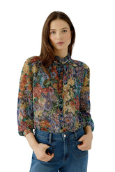 Oui women's close front view of the multicolor floral long-sleeve blouse with ruffled tie collar and black buttons
