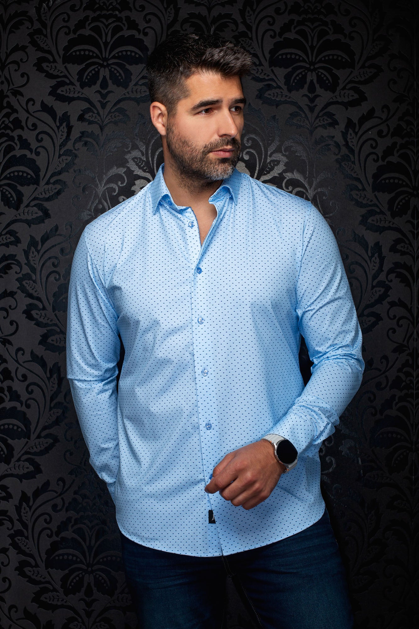 Au Noir men's light blue button-up shirt with spread collar and dark blue micro-dot pattern shown from the front