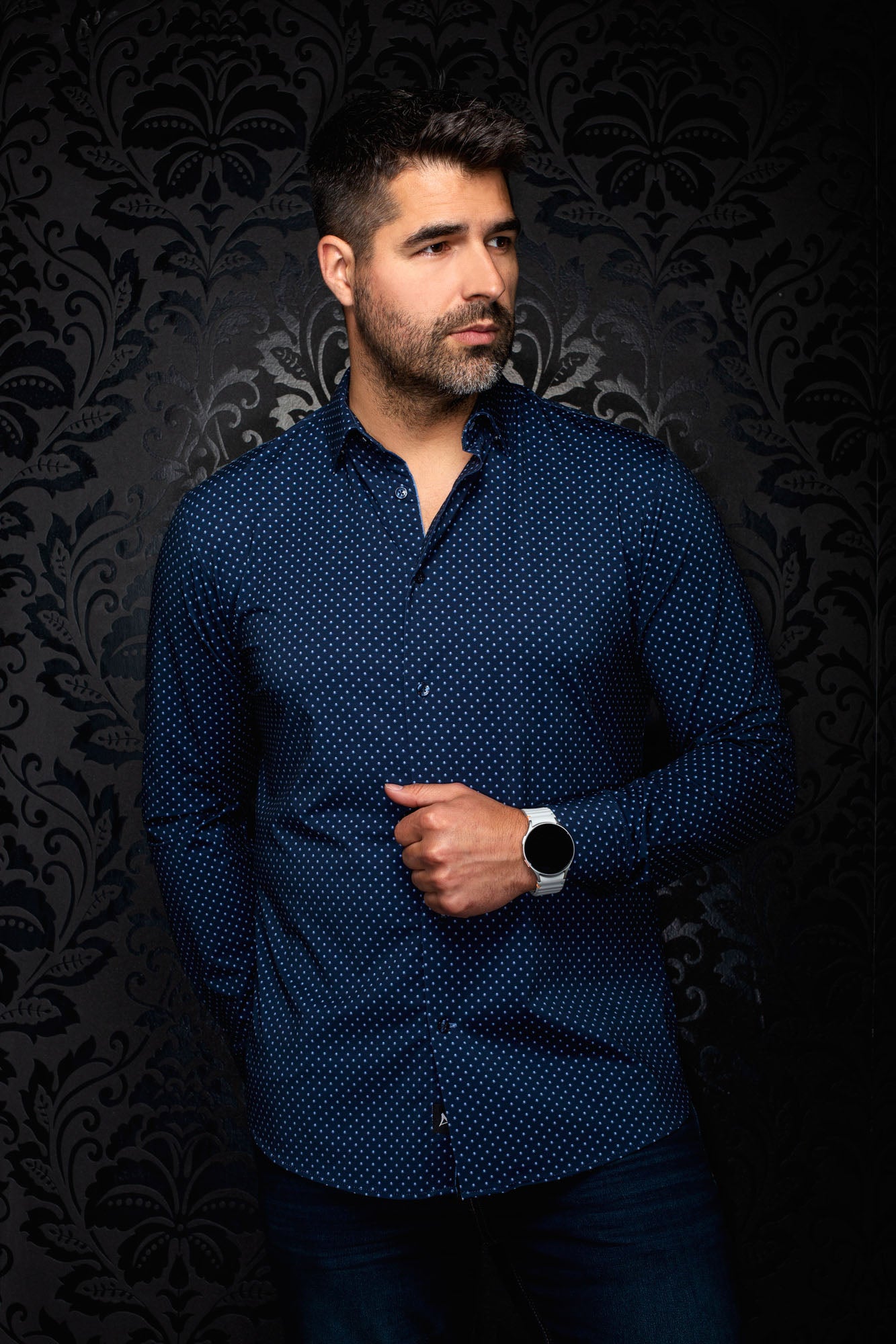 Au Noir men's navy long sleeve button-up shirt with small light blue dot print, front model view with open collar