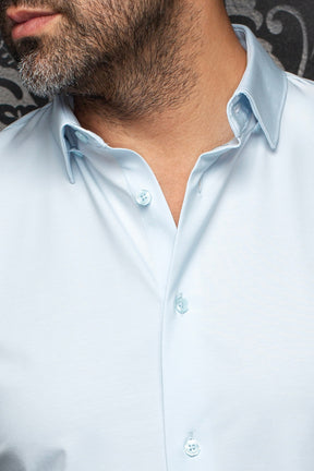 Au Noir men's light blue shirt collar, tonal buttons and open button placket, close-up