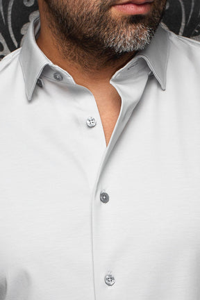 Au Noir men's light gray button-up shirt collar and placket with subtle texture and gray buttons, close-up