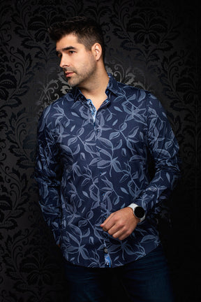 Au Noir men's angled model view of navy button-up shirt with contrast placket trim and light blue leaf print, side view