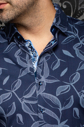 Close-up of men's navy leaf print shirt collar, buttons, and light blue paisley placket trim by Au Noir