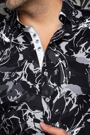 Close-up of men's black, gray, and white printed button-up shirt with contrast inner placket and collar by Au Noir