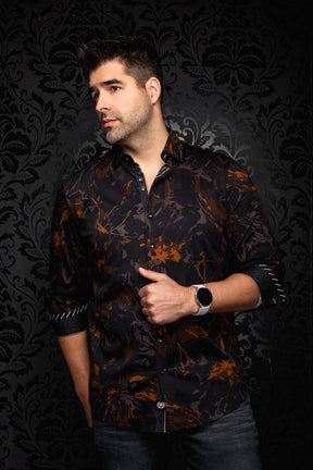 Au Noir men's black abstract floral button-up shirt with rolled cuffs and rust accents shown from the front