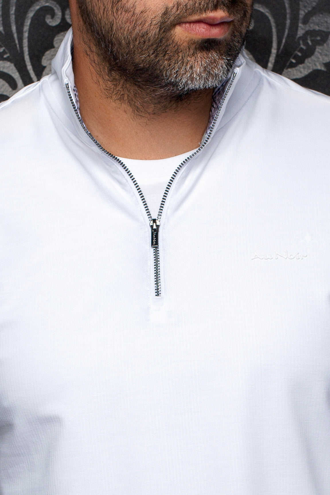 Detail view of Au Noir men's white sport jacket