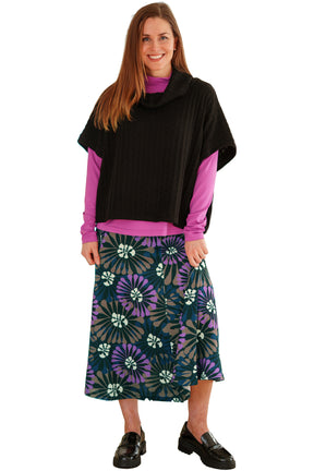 Women's full front view of black textured bolero capelet with draped collar by Rien ne se perd, tout se crée