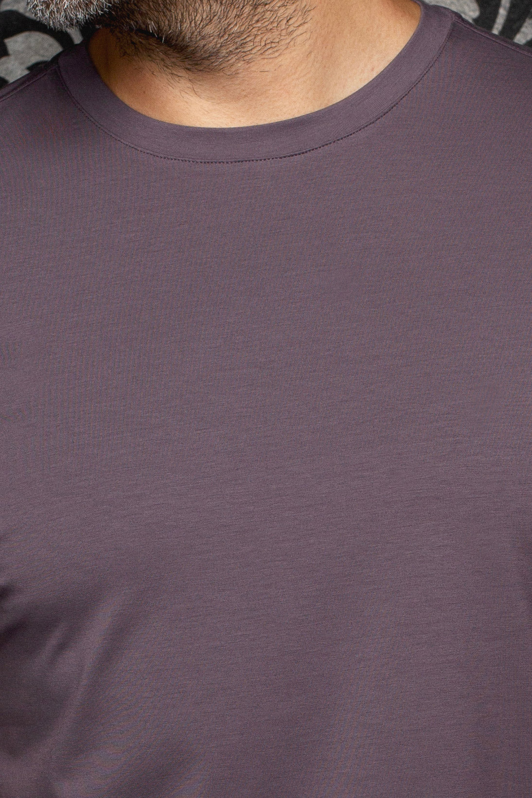 Au Noir men's mauve crewneck Short-sleeve T-Shirt shown close-up with smooth jersey texture and ribbed collar