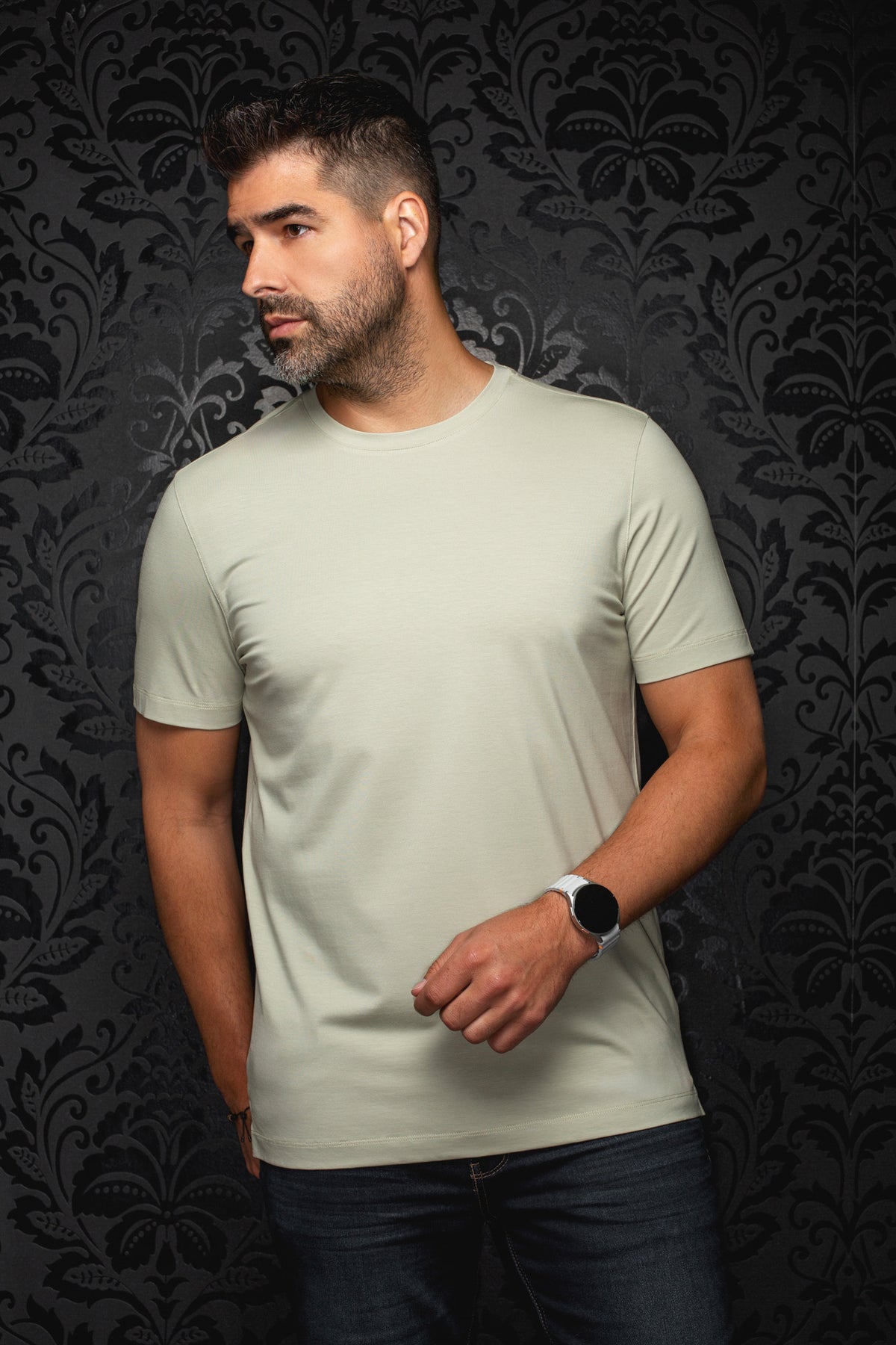 Au Noir men's pale sage green short sleeve crewneck T-Shirt on model with straight hem, front view