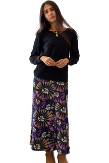 Rien ne se perd, tout se crée women's solid black long sleeve T-Shirt with wide round neckline shown from the front