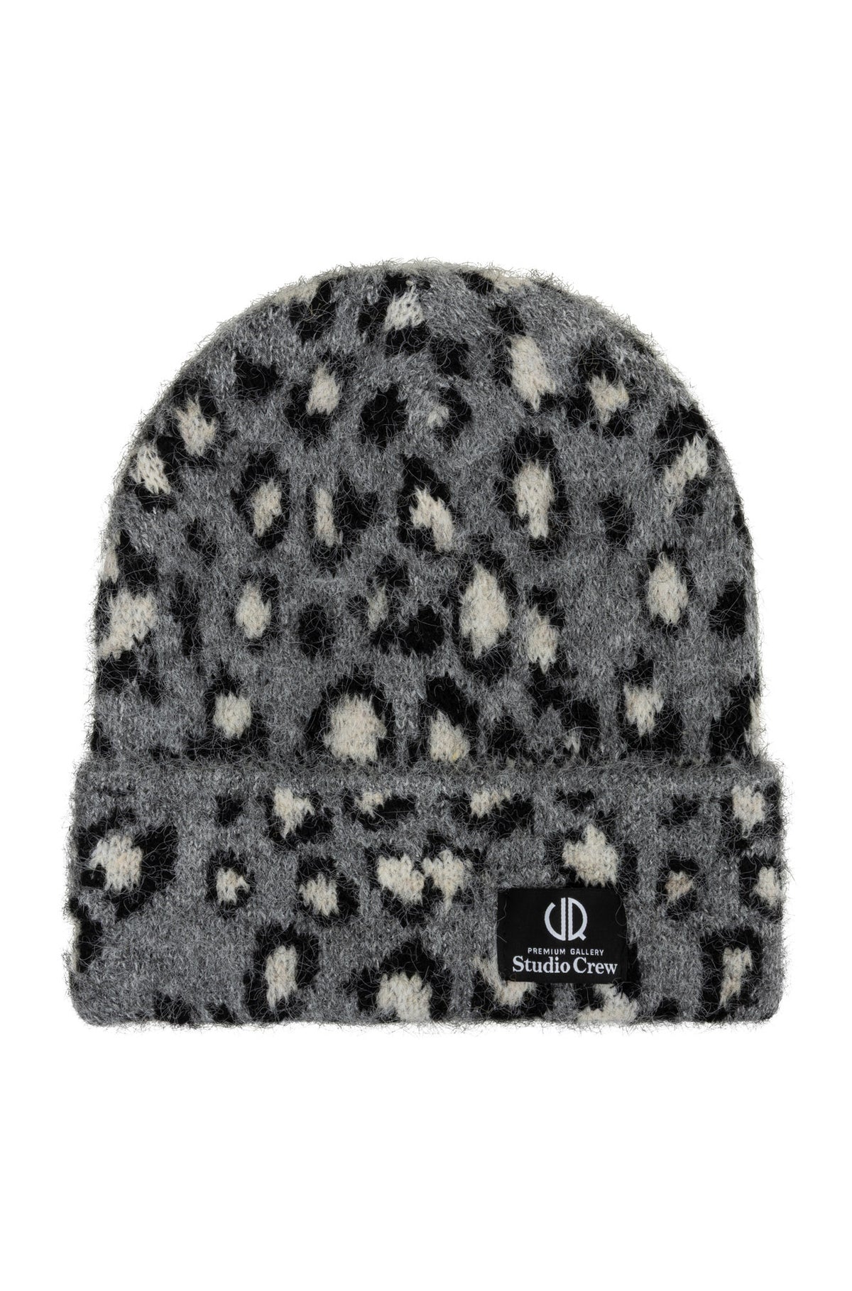 Tuque d’hiver grise duveteuse à motif tacheté et écusson noir pour femme par Esqualo, vue avant