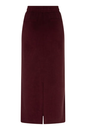 Esqualo women's burgundy long skirt with welt pockets and a center back slit shown from the back