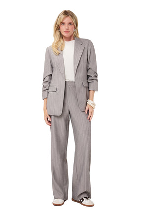 Esqualo women's full-body front view of a gray pinstriped blazer with notched lapels and flap pockets