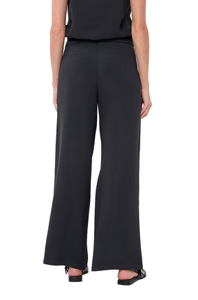 Vue arrière du pantalon à jambe large à cordon noir à jambe large avec poches passepoilées pour femme par Esqualo