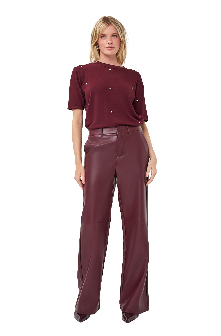 Esqualo women's full front model view of burgundy faux leather wide-leg pants with fly front and belt loops