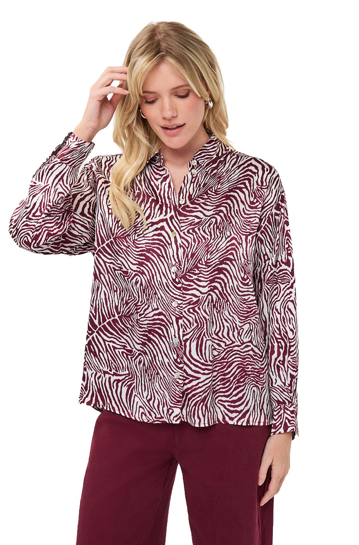 Esqualo women's ivory long-sleeve blouse with burgundy zebra-style print, collar, button placket, and shown from the front