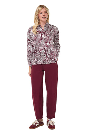 Esqualo women's ivory long-sleeve blouse with burgundy zebra-style print, collar, button placket, and shown from the front