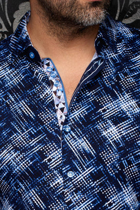 Au Noir men's navy patterned button-up shirt with light blue buttons and open collar, close-up