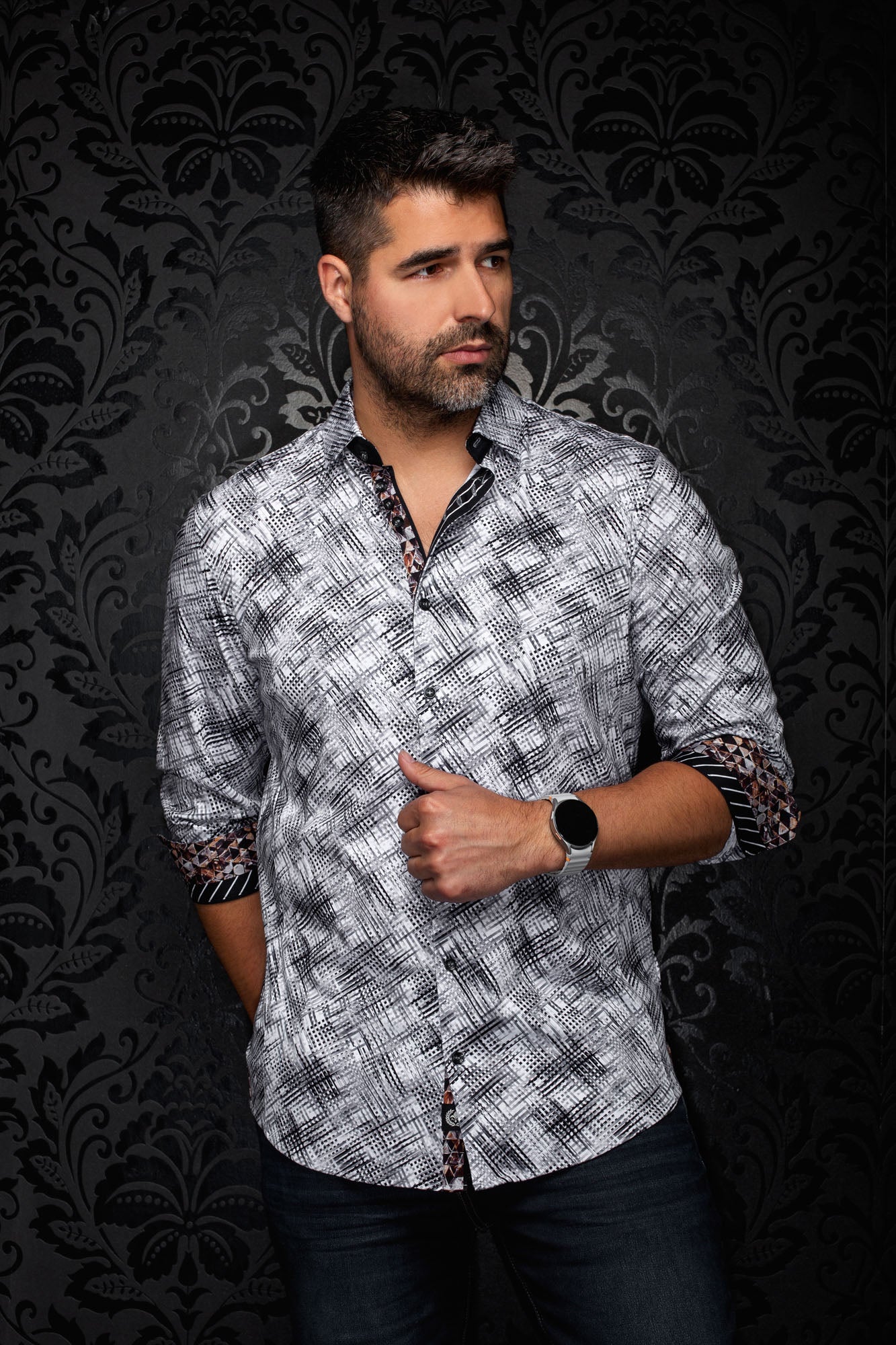 Front view of men's white and black patterned button-up shirt with contrast cuffs and rolled sleeves by Au Noir