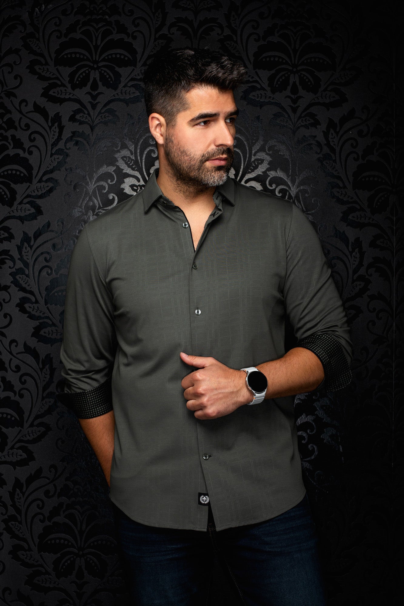 Au Noir men's olive green long sleeve button-up shirt with rolled black contrast cuffs, front view