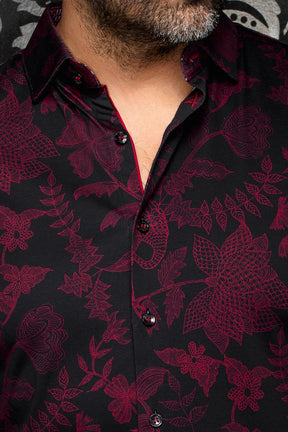 Au Noir men's black button-up shirt collar, red trim, glossy buttons and burgundy floral print, close-up