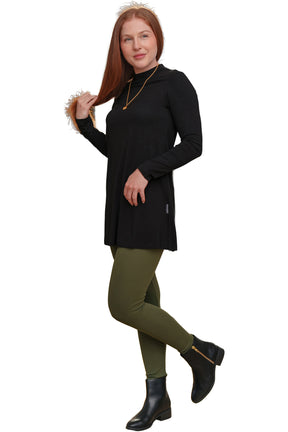 Rien ne se perd, tout se crée women's olive green leggings on model, angled side view showing slim leg and ankle-length hem