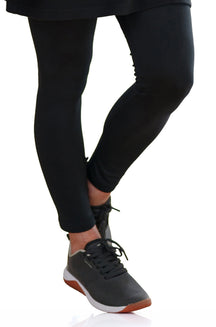 Rien ne se perd, tout se crée women's black fitted ankle-length leggings worn, front model view, close view