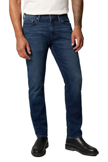 Front view of men's dark blue washed straight-leg jeans with five-pocket styling, button waist by Mavi Jeans