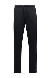 Pantalon jogging sport noir isolé avec taille élastique et cordon à embouts métalliques pour homme par Psycho Bunny