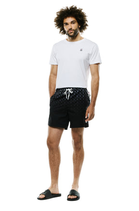 Vue de face plein pied du short maillot de bain noir avec cordon blanc pour homme par Psycho Bunny