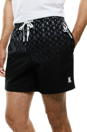 Gros plan avant du short maillot de bain noir avec cordon blanc et étiquette côté pour homme par Psycho Bunny
