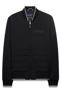 Veste coupe-vent mi-saison noire zippé à devant matelassé, col, poignets, vue produit pour homme par Psycho Bunny